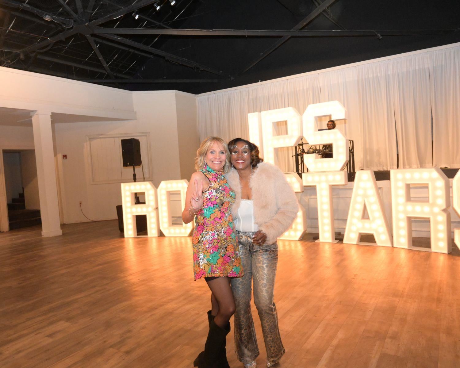Women smiling in the banquet hall