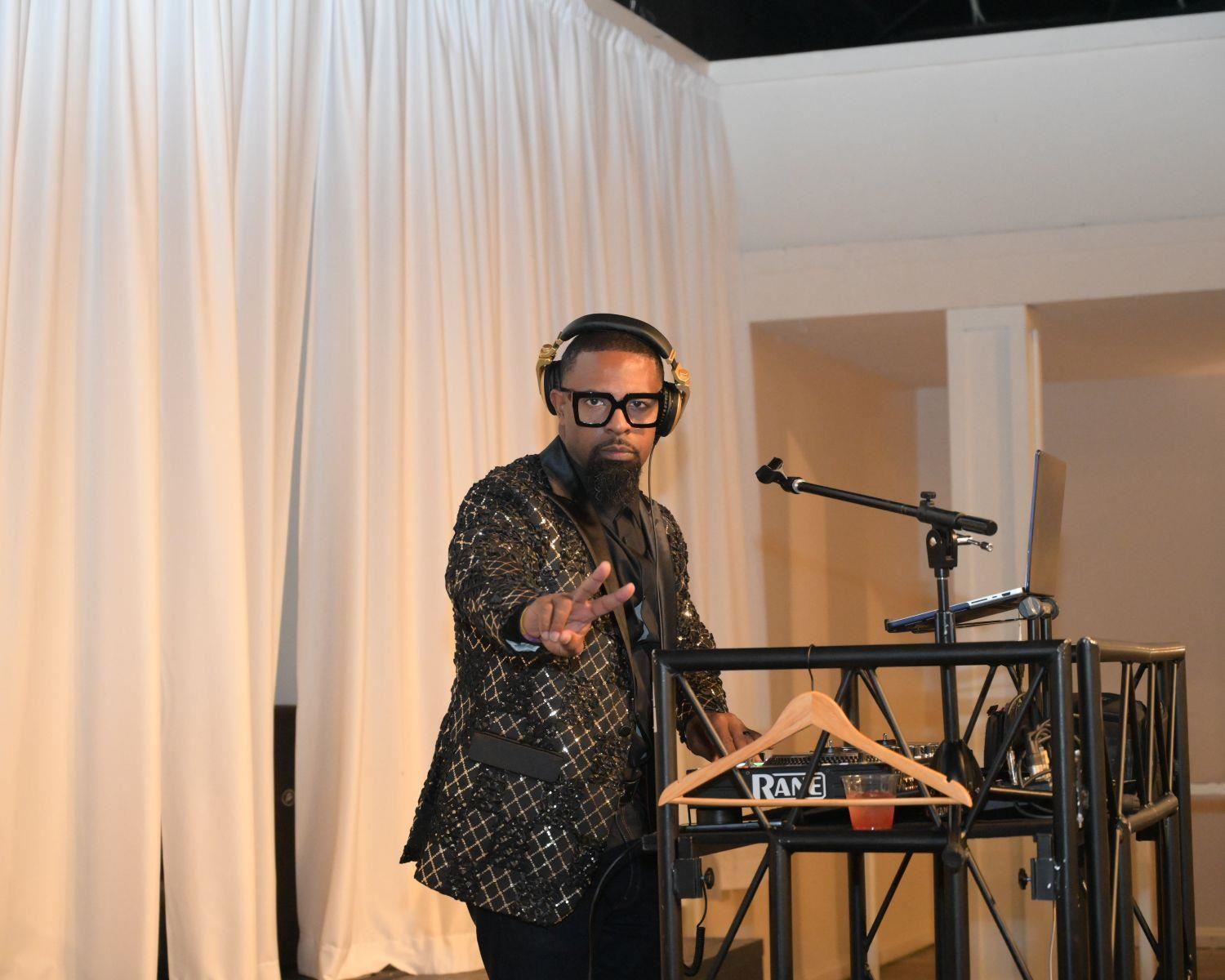 DJ giving the peace sign